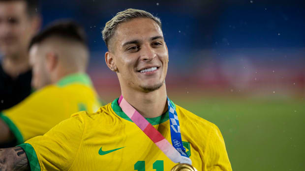Antony pictured with an Olympic gold medal after helping Brazil win the men's soccer tournament at the Tokyo Games in 2021