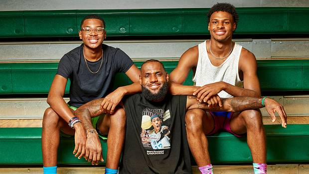 LeBron James poses with his sons Bronny and Bryce.