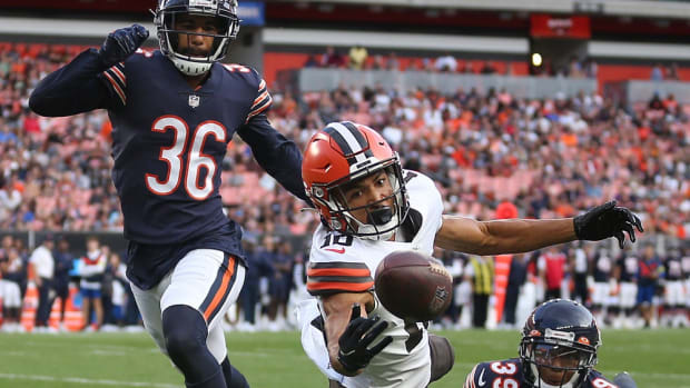 Cleveland Browns wide receiver Anthony Schwartz (10) cannot hang onto a pass against Chicago Bears safety DeAndre Houston-Carson (36) and Chicago Bears cornerback Greg Stroman Jr. (39) during the first half of an NFL preseason football game, Saturday, Aug. 27, 2022, in Cleveland, Ohio. Brownsjl 31