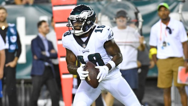 Eagles wide receiver Jalen Reagor (18) runs with the ball during a preseason game against the New York Jets.