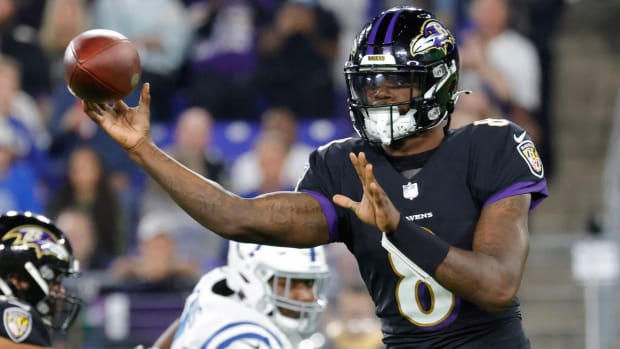 Lamar Jackson throws a pass against the Colts during a 2021 game