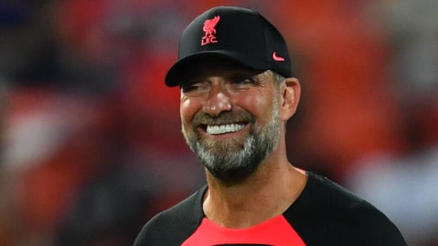 Liverpool manager Jurgen Klopp pictured smiling during a pre-season training session in July 2022