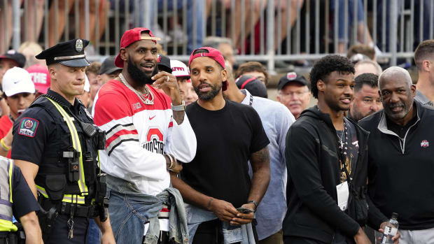 Sep 3, 2022; Columbus, Ohio, USA; LeBron James and his son Bronny James look on before a football game between the Ohio State Buckeyes and Notre Dame Fighting Irish at Ohio Stadium.