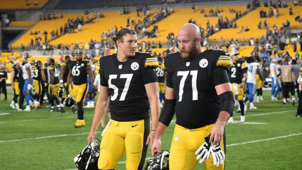 Aug 21, 2021; Pittsburgh, Pennsylvania, USA; Pittsburgh Steelers players Kameron Canaday (57) and Joe Haeg (71) leave the field after the game against the Detroit Lions at Heinz Field. Mandatory Credit: Philip G. Pavely-USA TODAY Sports