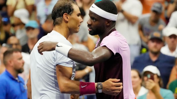 Sept 5, 2022; Flushing, NY, USA; Frances Tiafoe of the USA, right, greets Rafael Nadal of Spain at the net after their match on day eight of the 2022 U.S. Open tennis tournament at USTA Billie Jean King National Tennis Center. Mandatory Credit: Robert Deutsch-USA TODAY Sports
