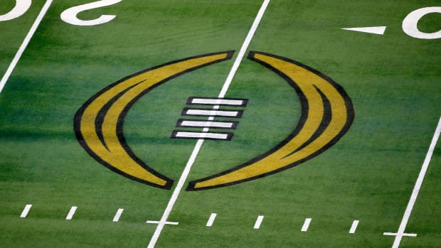 College Football Playoff logo is painted on the field