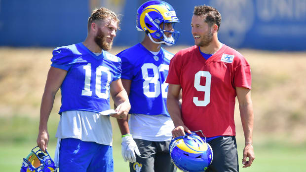 Jun 8, 2022; Los Angeles, CA, USA; Los Angeles Rams wide receiver Cooper Kupp (10) speaks with quarterback Matthew Stafford (9) during mini camp at Cal Lutheran University.