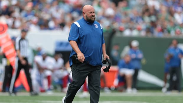 Aug 28, 2022; East Rutherford, New Jersey, USA; New York Giants head coach Brian Daboll walks onto the field during the first half against the New York Jets at MetLife Stadium.
