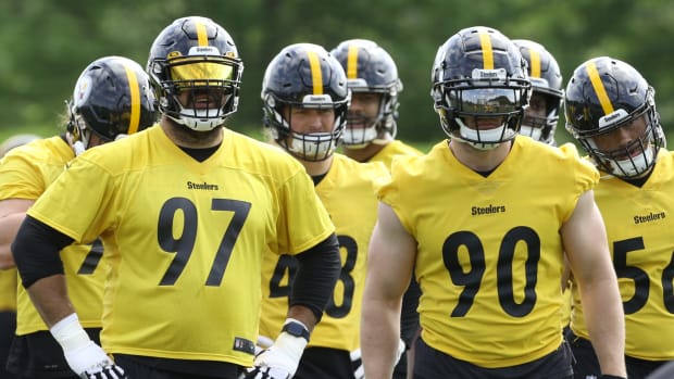 May 24, 2022; Pittsburgh, PA, USA; Pittsburgh Steelers defensive end Cameron Heyward (97) and linebacker TJ Watt (90) participate in organized team activities at UPMC Rooney Sports Complex. Mandatory Credit: Charles LeClaire-USA TODAY Sports