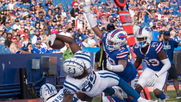 Aug 13, 2022; Orchard Park, New York, USA; Indianapolis Colts tight end Andrew Ogletree (85) reaches the ball across the goal line in the fourth quarter pre-season game against the Buffalo Bills at Highmark Stadium. Mandatory Credit: Mark Konezny-USA TODAY Sports