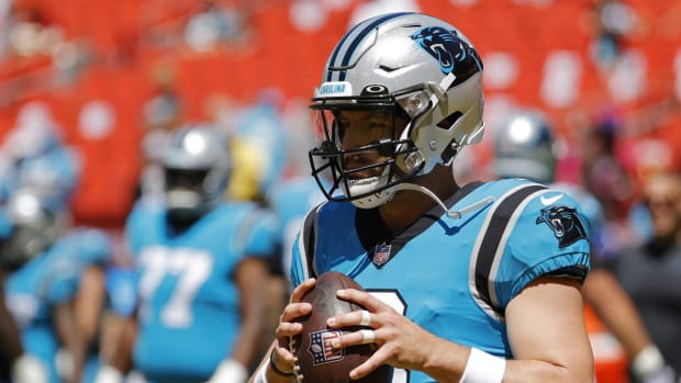 Aug 13, 2022; Landover, Maryland, USA; Carolina Panthers quarterback Baker Mayfield (6) holds a ball during warmups prior to the game against the Washington Commanders at FedExField. Mandatory Credit: Geoff Burke-USA TODAY Sports