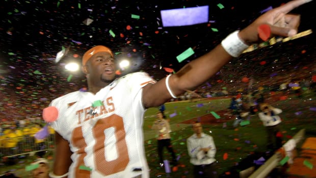 Texas Longhorns quarterback (10) Vince Young celebrates after defeating the Southern California Trojans 41-38 in the 2006 Rose Bowl Game to win the national championship. in Pasadena, California.