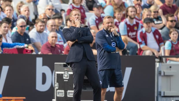 Brighton boss Graham Potter pictured (left) with assistant manager Billy Reid during a Premier League game against West Ham in August 2022