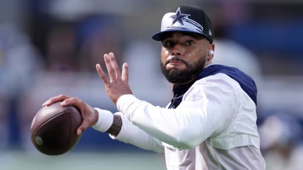 Dallas Cowboys quarterback Dak Prescott throws the ball before the game against the Los Angeles Chargers.
