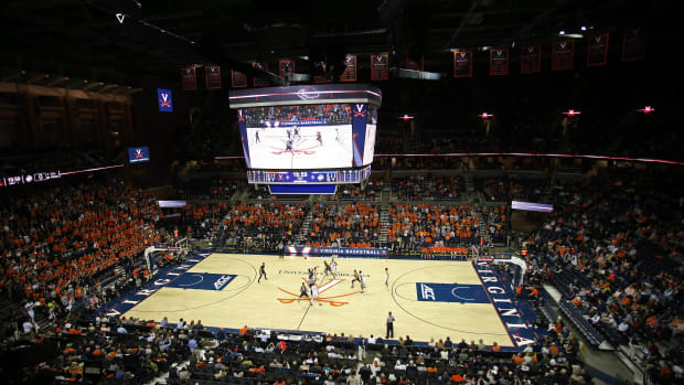 A general view of the opening tip of the game between the Virginia Cavaliers and the UNC-Greensboro Spartans at John Paul Jones Arena. The Cavaliers won 60-48.