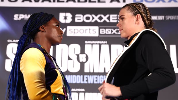 Claressa Shields (L) and Savannah Marshall (R) face-off during the press conference ahead of their undisputed middleweight championship fight at Canary Riverside Plaza Hotel on September 08, 2022 in London, England.
