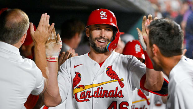 Aug 16, 2022; St. Louis, Missouri, USA; St. Louis Cardinals first baseman Paul Goldschmidt (46) is congratulated by teammates after hitting a two run home run against the Colorado Rockies during the fifth inning at Busch Stadium.