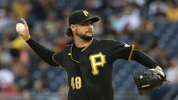 Pirates pitcher Tyler Beede throws a pitch.