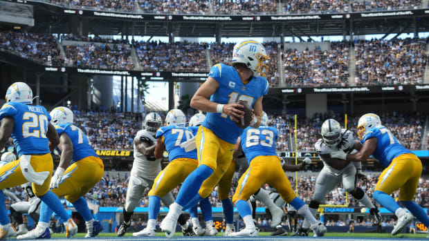 Sep 11, 2022; Inglewood, California, USA; Los Angeles Chargers quarterback Justin Herbert (10) drops back to pass against the Las Vegas Raiders in the second half at SoFi Stadium. Mandatory Credit: Kirby Lee-USA TODAY Sports