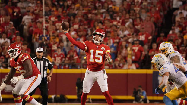 Sep 15, 2022; Kansas City, Missouri, USA; Kansas City Chiefs wide receiver Justin Watson (84) runs the ball for a touchdown against the Los Angeles Chargers during the second half at GEHA Field at Arrowhead Stadium. Mandatory Credit: Jay Biggerstaff-USA TODAY Sports