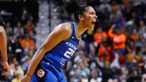 Connecticut Sun’s Alyssa Thomas reacts during the first half in Game 3 of a WNBA basketball final playoff series against the Las Vegas Aces, Thursday, Sept. 15, 2022, in Uncasville, Conn. (AP Photo/Jessica Hill)