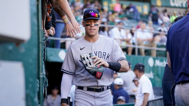 New York Yankees OF Aaron Judge walks through dugout