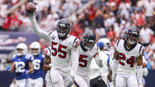 Houston Texans defensive end Jerry Hughes (55) celebrates after an interception during the second quarter against the Indianapolis Colts at NRG Stadium.