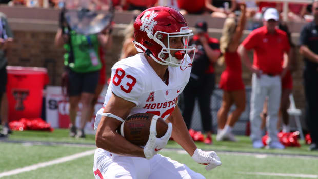 Sep 10, 2022; Lubbock, Texas, USA; Houston Cougars wide receiver Preston Sawyer (83) rushes against the Texas Tech Red Raiders in the first half at Jones AT&T Stadium and Cody Campbell Field. Mandatory Credit: Michael C. Johnson-USA TODAY Sports