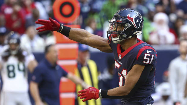 Houston Texans outside linebacker Kamu Grugier-Hill (51) reacts after a defensive play during the second quarter against the Seattle Seahawks at NRG Stadium.