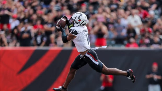 Sep 17, 2022; Cincinnati, Ohio, USA; Cincinnati Bearcats wide receiver Tre Tucker (1) catches a pass against the Miami Redhawks in the first half at Paycor Stadium. Mandatory Credit: Katie Stratman-USA TODAY Sports