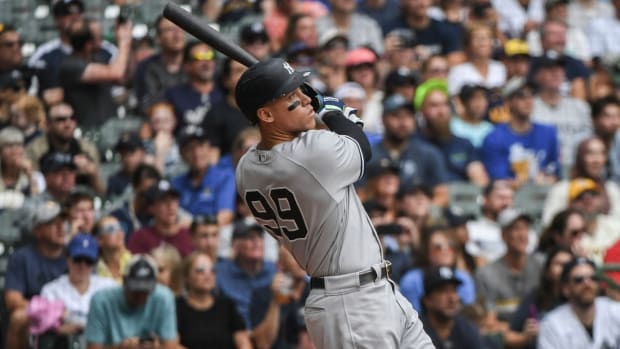 New York Yankees’ Aaron Judge hits his fifty eighth homerun during the third inning of a baseball game against the Milwaukee Brewers Sunday, Sept. 18, 2022, in Milwaukee. (AP Photo/Kenny Yoo)
