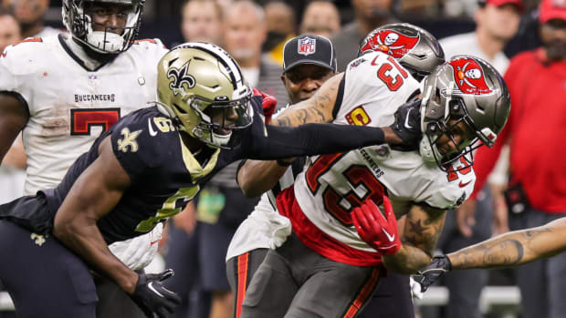 Saints cornerback Lattimore (23) gets into a penalty with Tampa Bay Buccaneers wide receiver Evans (13) and they are ejected after the play during the second half on Sept. 18, 2022.