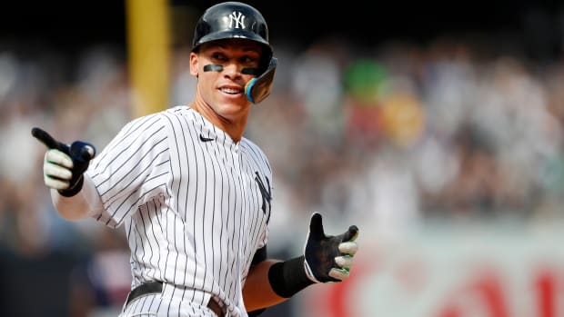 New York Yankees right fielder Aaron Judge (99) reacts while rounding the bases after hitting a home run against the Minnesota Twins during the sixth inning of a baseball game Monday, Sept. 5, 2022, in New York.