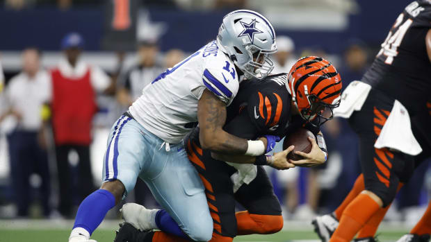 Sep 18, 2022; Arlington, Texas, USA; Dallas Cowboys linebacker Micah Parsons (11) sacks Cincinnati Bengals quarterback Joe Burrow (9) in the third quarter at AT&T Stadium. Mandatory Credit: Tim Heitman-USA TODAY Sports