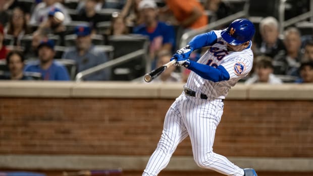 Sep 17, 2022; New York City, New York, USA; New York Mets third baseman Eduardo Escobar (10) hits a three run home run against the Pittsburgh Pirates during the second inning at Citi Field.
