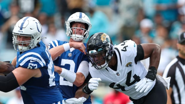 Sep 18, 2022; Jacksonville, Florida, USA; Indianapolis Colts quarterback Matt Ryan (2) is pressured by Jacksonville Jaguars linebacker Travon Walker (44) in the first quarter at TIAA Bank Field. Mandatory Credit: Nathan Ray Seebeck-USA TODAY Sports