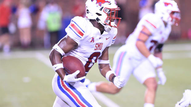 SMU's Bryan Massey (0) returns an interception on the final play of Saturday's game against ACU at Gerald J. Ford Stadium in Dallas on Sept. 4, 2021. The Mustangs won 56-9. Hof 8420 2