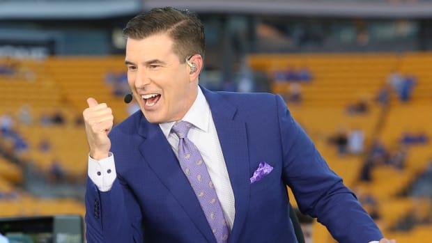 ESPN College Game Day announcer Rece Davis performs during the pre-game show before Pittsburgh hosts West Virginia.