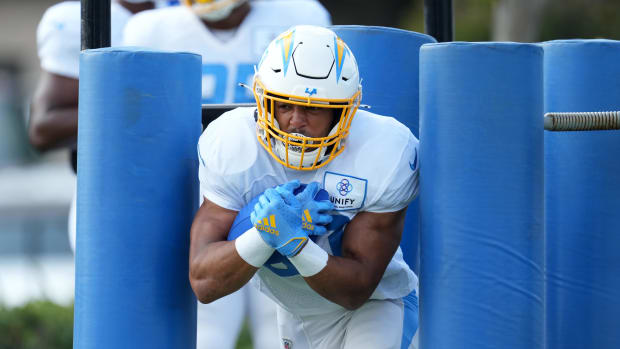 Aug 1, 2022; Costa Mesa, CA, USA; Los Angeles Chargers running back Austin Ekeler (30) carries the ball during training camp at the Jack Hammett Sports Complex. Mandatory Credit: Kirby Lee-USA TODAY Sports