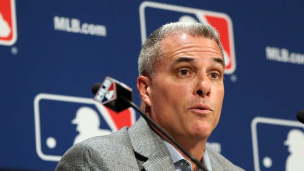 Dec 7, 2016; National Harbor, MD, USA; Kansas City Royals general manager Dayton Moore speaks with the media after announcing a trade of relief pitcher Wade Davis for outfielder Jorge Soler (both not pictured) on day three of the 2016 Baseball Winter Meetings at Gaylord National Resort & Convention Center. Mandatory Credit: Geoff Burke-USA TODAY Sports