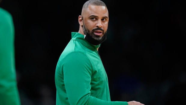 FILE - Boston Celtics head coach Ime Udoka speaks from the bench during the first half of an NBA basketball game against the Charlotte Hornets, Wednesday, Feb. 2, 2022, in Boston. The Boston Celtics are planning to discipline coach Ime Udoka, likely with a suspension, because of an improper relationship with a member of the organization, two people with knowledge of the matter told The Associated Press on Thursday, Sept. 22, 2022. (AP Photo/Steven Senne, File)