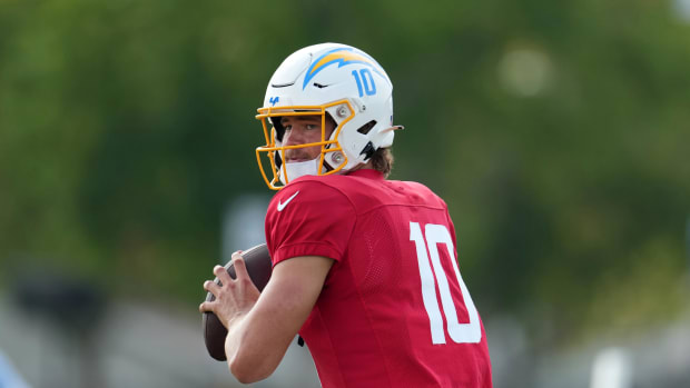 Aug 1, 2022; Costa Mesa, CA, USA; Los Angeles Chargers quarterback Justin Herbert (10) throws the ball during training camp at the Jack Hammett Sports Complex. Mandatory Credit: Kirby Lee-USA TODAY Sports