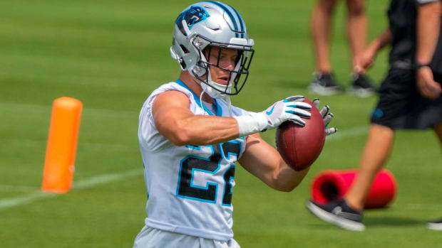 Panthers running back Christian McCaffrey catches a pass in practice during training camp.