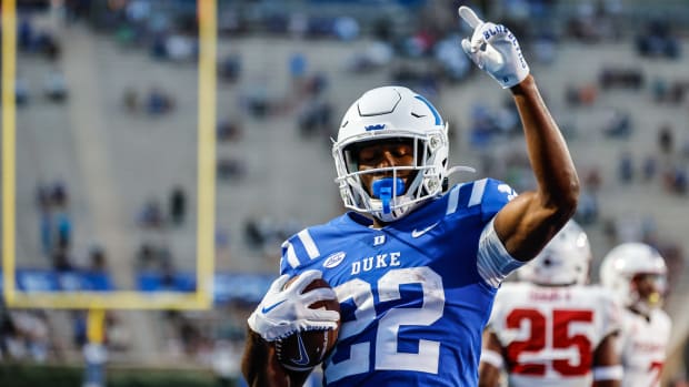 Sep 2, 2022; Durham, North Carolina, USA; Duke Blue Devils running back Jaylen Coleman (22) scores a touchdown during 1st half of the game against Temple University at Wallace Wade Stadium. Mandatory Credit: Jaylynn Nash-USA TODAY Sports