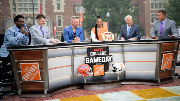 From left, Desmond Howard, Rece Davis, Pat McAfee, Bianca Belair, Lee Corso and Kirk Herbstreit at the ESPN College GameDay stage outside of Ayres Hall on the University of Tennessee campus in Knoxville, Tenn.
