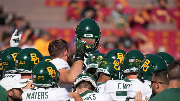 Members of the Baylor Bears football team get ready for kickoff against Iowa State at Jack Trice Stadium.