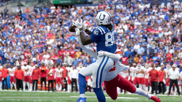 Indianapolis Colts tight end Jelani Woods (80) pulls in a touchdown catch while being guarded by Kansas City Chiefs safety Juan Thornhill (22) putting the Indianapolis Colts ahead with 24 seconds left in the game Sunday, Sept. 25, 2022, during a game against the Kansas City Chiefs at Lucas Oil Stadium in Indianapolis.