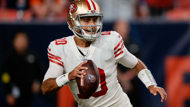 Sep 25, 2022; Denver, Colorado, USA; San Francisco 49ers quarterback Jimmy Garoppolo (10) drops back in the second quarter against the Denver Broncos at Empower Field at Mile High. Mandatory Credit: Isaiah J. Downing-USA TODAY Sports