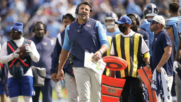 Tennessee Titans head coach Mike Vrabel (front) walks the sidelines during the fourth quarter against the Las Vegas Raiders at Nissan Stadium.