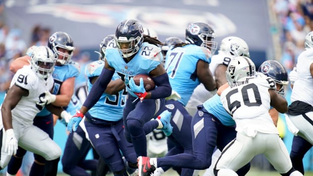 Tennessee Titans running back Derrick Henry (22) carries the ball against the Las Vegas Raiders during the first quarter at Nissan Stadium Sunday, Sept. 25, 2022, in Nashville, Tenn.